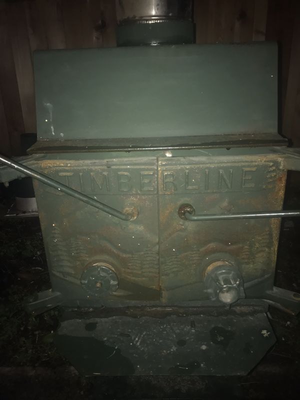 Timberline wood stove/heater. Comes with 20 to 30 feet of flume or chimney. Flute is 8 inches in