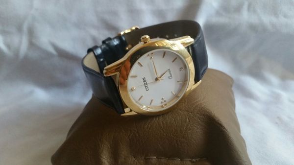 citizen quartz 23k gold plated water resistant