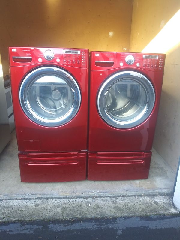LG RED FRONT LOAD WASHER AND DRYER ON PEDESTAL for Sale in Portland, OR