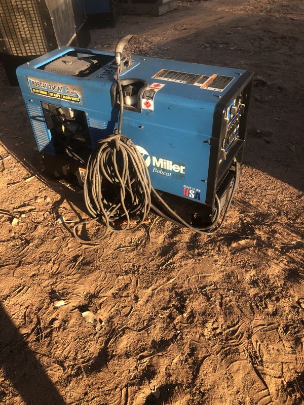 Miller Bobcat 250 NT with built in 12v/24v/36v battery charger also for