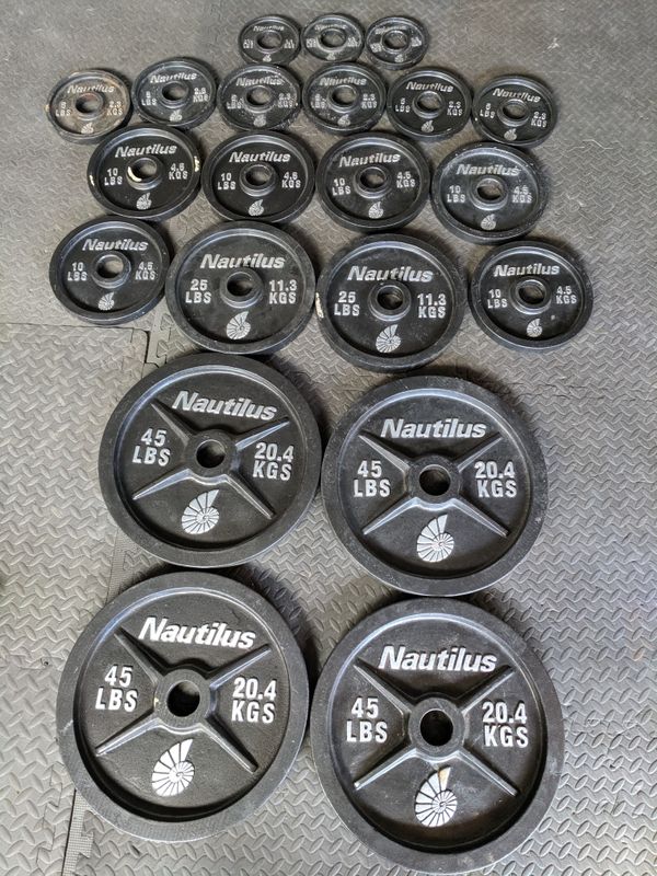 Nautilus Squat Rack, Bench, Olympic Weights, and Bars for Sale in