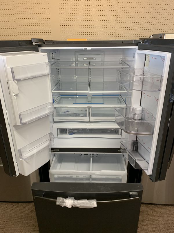 Brand new scratch and dent GE 27.8 cu. ft French door refrigerator with doorindoor Black Slate
