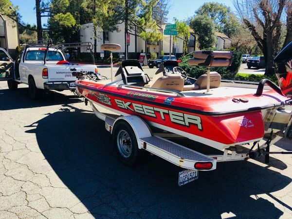 19ft 1997 skeeter bass boat wrapped with 150hp Yamaha dual