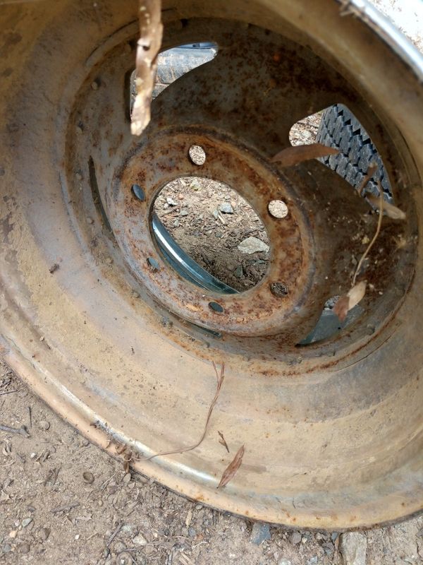 Used 15 inch rim (one) (saw blades) reverse offset 15x10 chrome deep