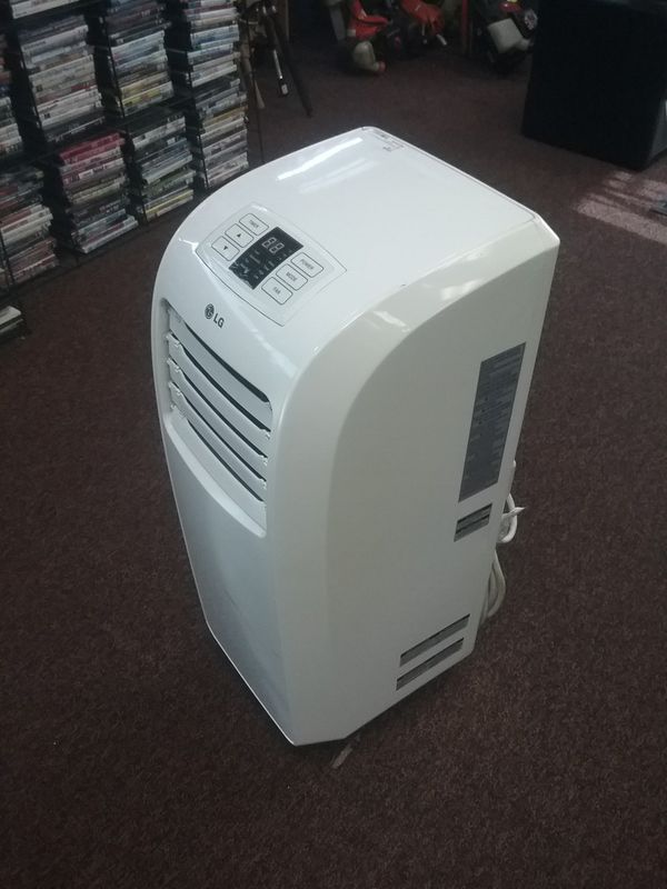 LG LP0711WNRY2; 8,000 BTU portable air conditioner with exhaust hose *missing window seal