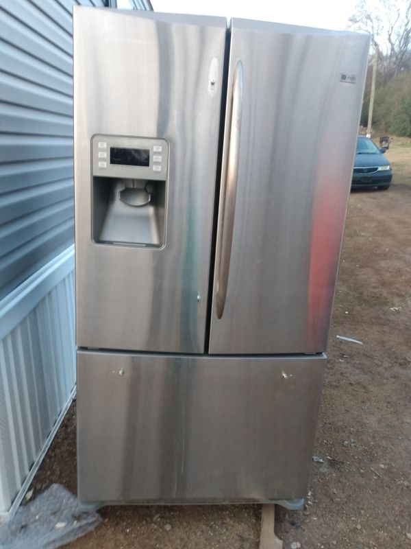 Kenmore Side by Side(newer one)w/freezer on bottom. Stainless Steal, mint condition, wrks