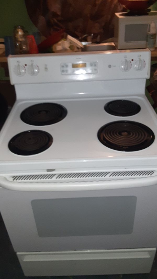 GE Profile true temp electric stove for top burners and brand new oven