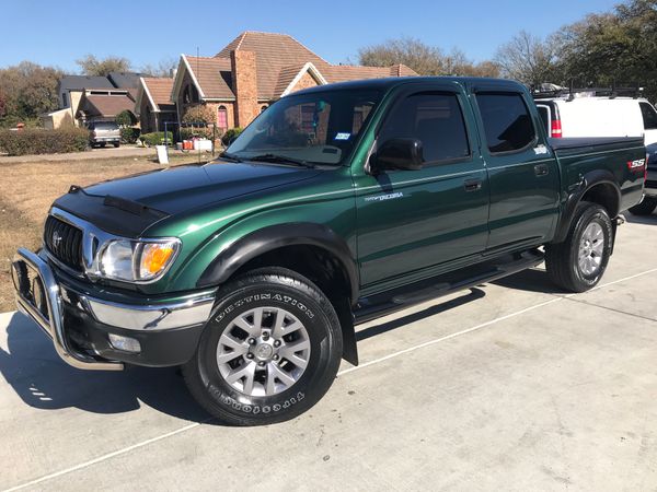 2003 TOYOTA TACOMA PRE FUNNER REBUILT SALVAGE TITLE MILES 156,000 CLEAN IN SIDE AND OUT SIDE ...