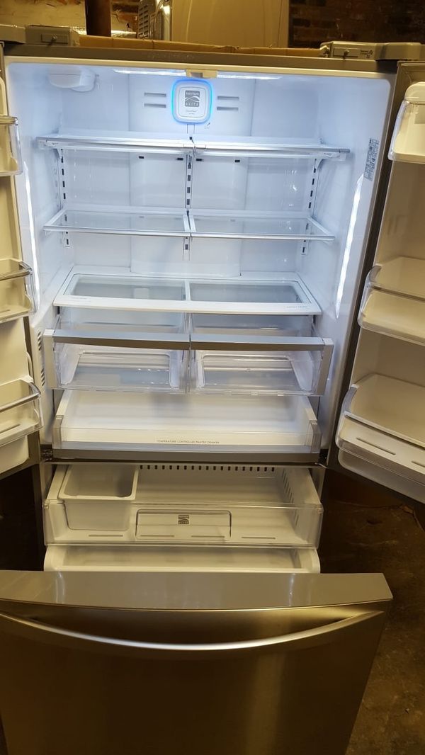 36” inches wide 30” inches deep and 70” high refrigerator bottom