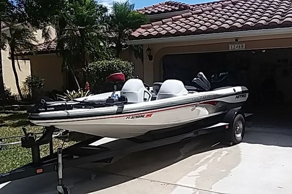 white and red nitro nx 750 bass boat with trailer for Sale in Fort ...