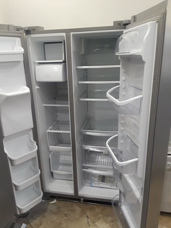 Brand new Frigidaire side to side stainless steel refrigerator Model