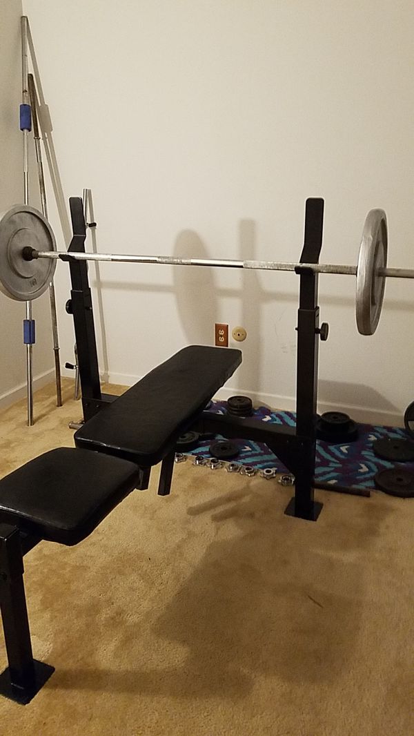 "Bench press "Olympic bench, and bar. 100lbs of weight. 135 total. 550