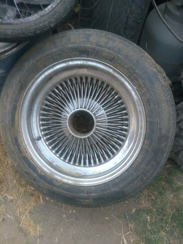 100 spoke 15" standard rims and tires . for Sale in Bakersfield, CA