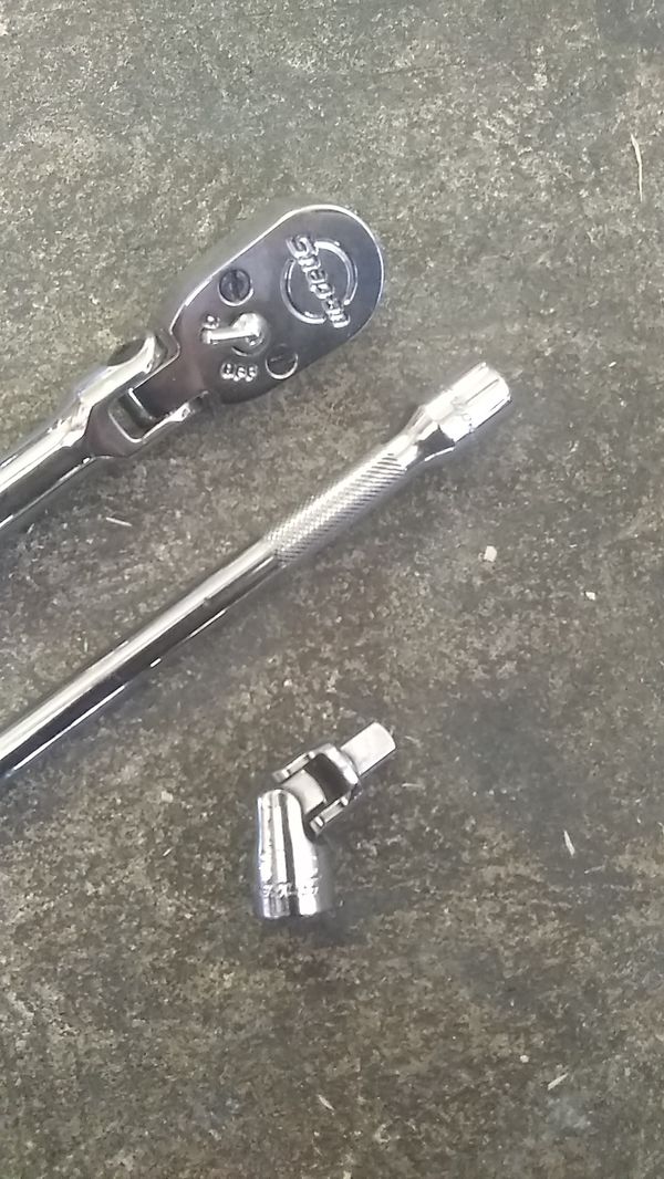 Snap on. All 1/4 flex head long handled ratchet and breaker bar and a