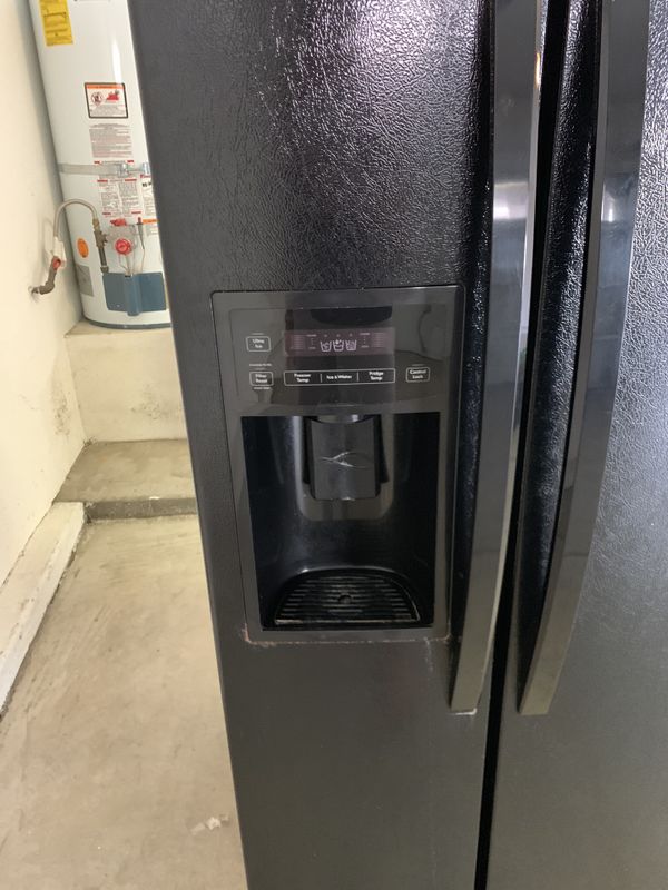 Black Kenmore side by side refrigerator for Sale in Sacramento, CA