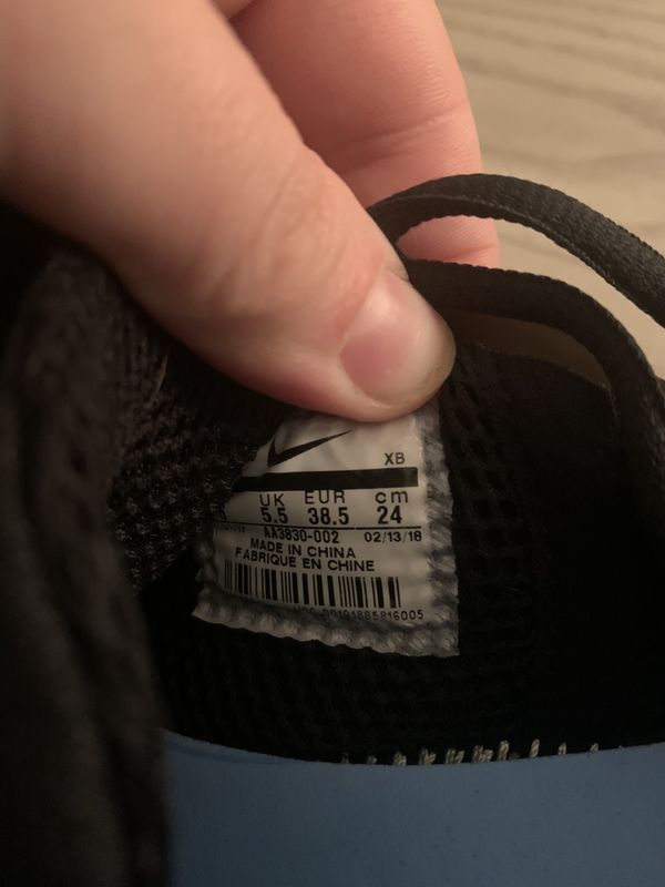 nike off white red tag