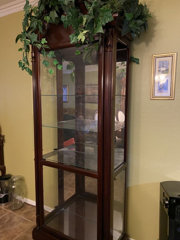 Cherry red curio glass shelves w light for Sale in Peoria, AZ OfferUp