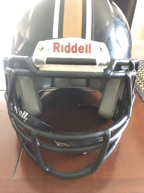 Riddell extra padded football helmet and is a size medium for Sale in