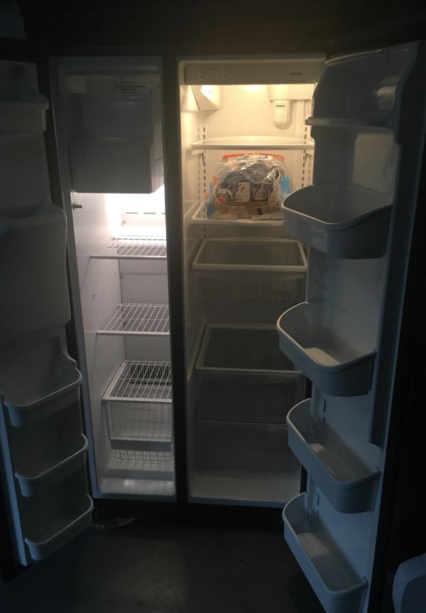 Kenmore stainless and black refrigerator for Sale in Palm Harbor, FL